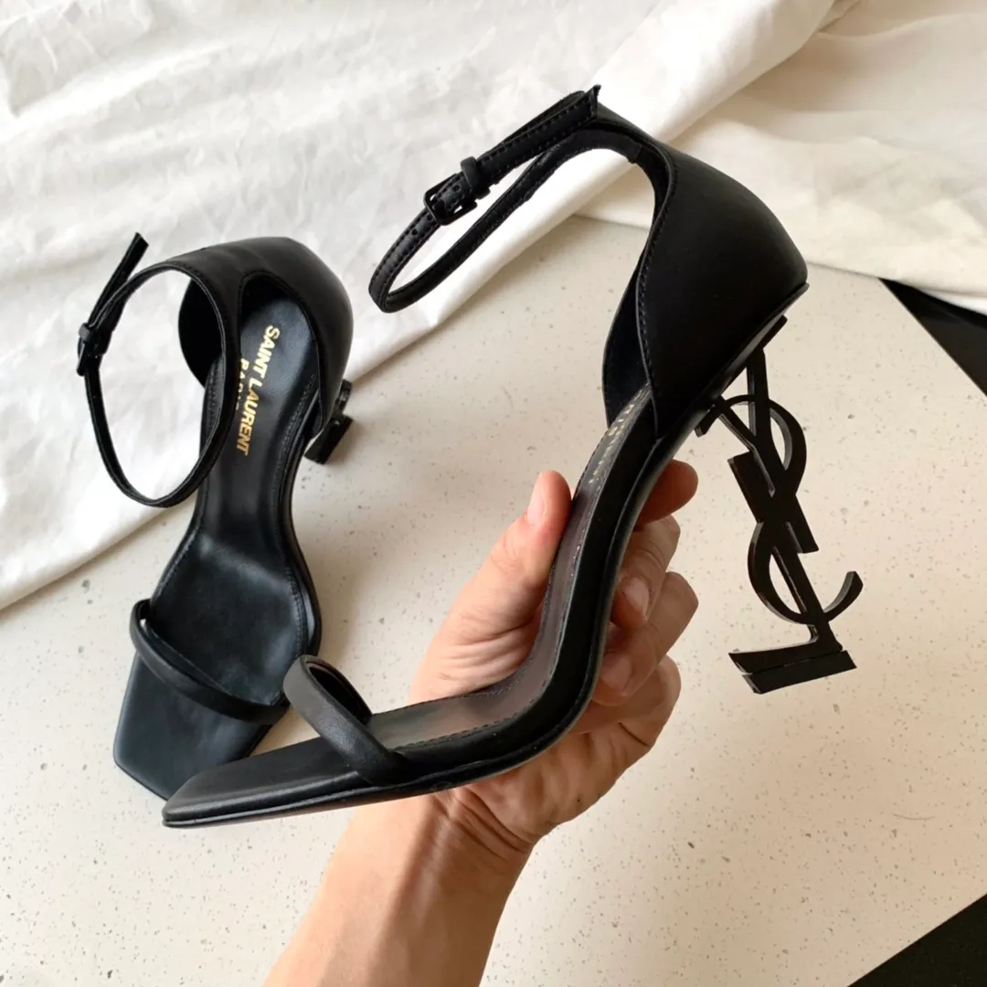 👟👟Ex-factory price 520👟👟 Women's Shoes Women's Clothes Women's Shoes Women's Clothes Women's Shoes Women's Clothes SAINT LAUREN*" Saint Laurent YSL classic one-word heel high-heeled sandals with logo letters. Only YSL understands women's hearts best and does not accept refutation. It is a super invincible feminine artifact and a must-have for women (✅Full-body customization, self-molded toe hardware, perfect consistency) Upper: Customized imported cotton silk weaving/imported calf patent leather Lining: Imported 🐑Sheep leather Sole: Imported genuine leather outsole Heel height: 9cm Color: black lacquer with silver, black with gold Size: 35-39 (full set of packaging)